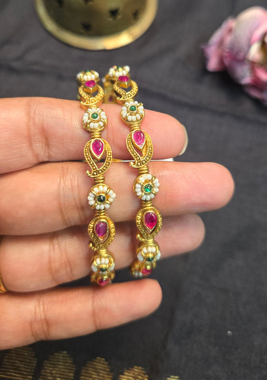 Pearls and ruby bangles