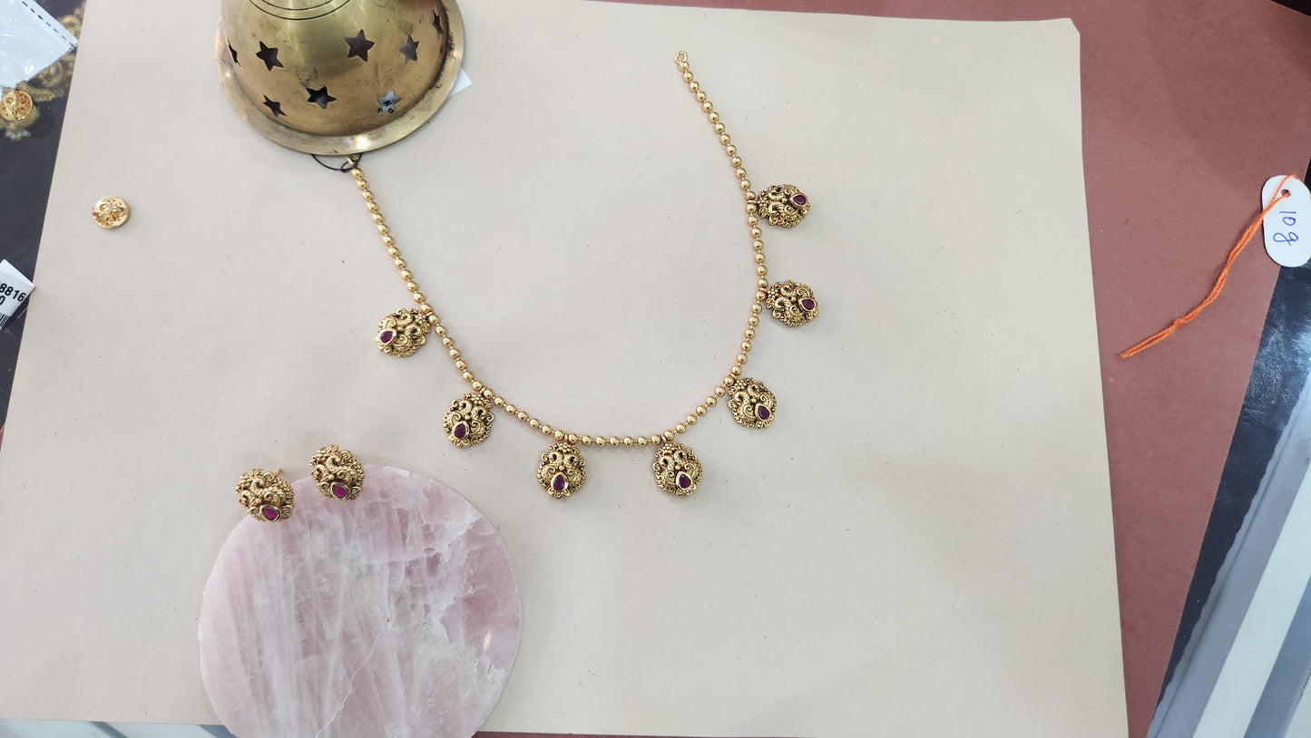 Ball Chain with charm pendants and red stone