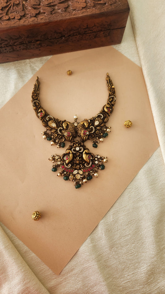 Deep Nakas Necklace with deep peacock motifs