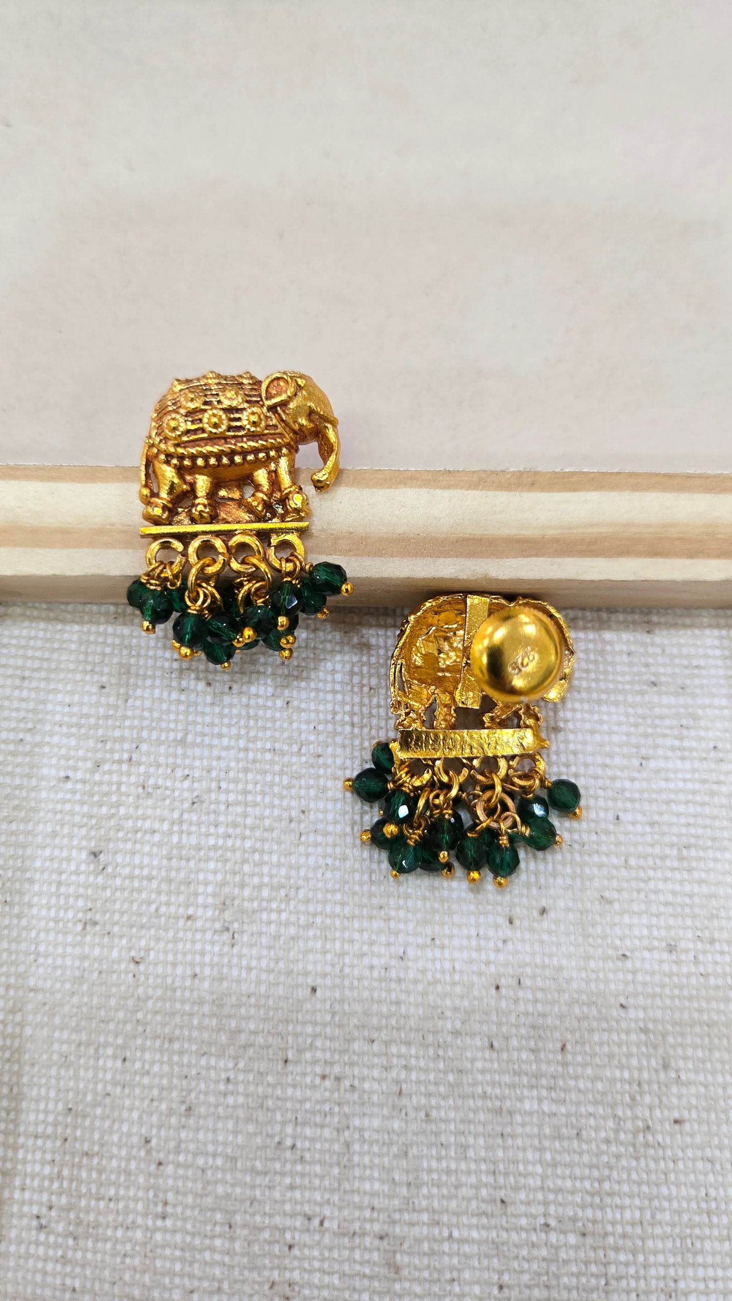Green elephant earring