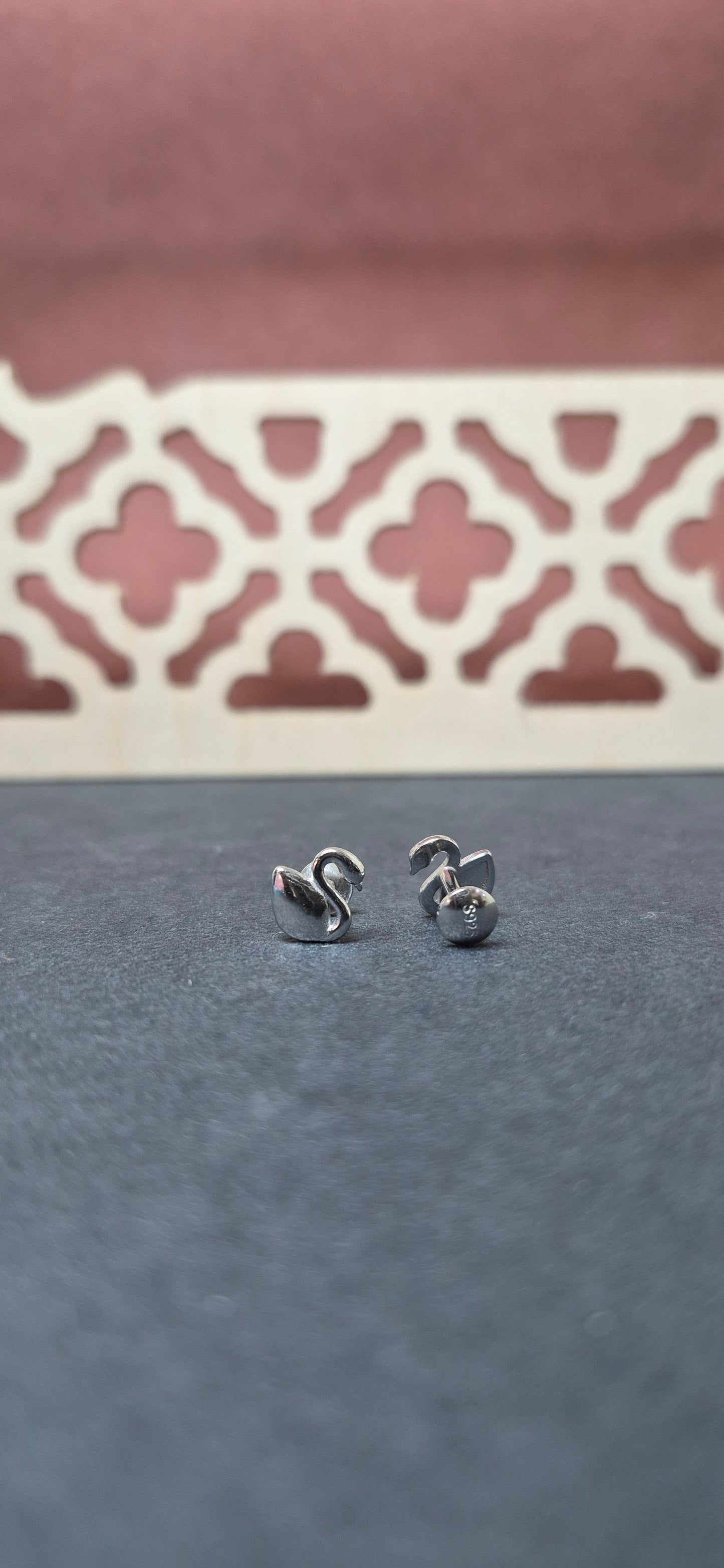 Swan studs