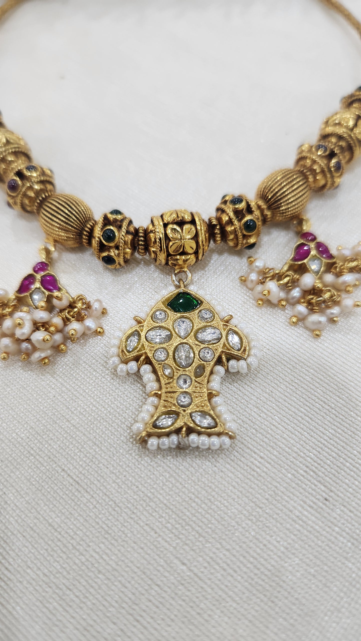 Nagas balls and kundan necklace