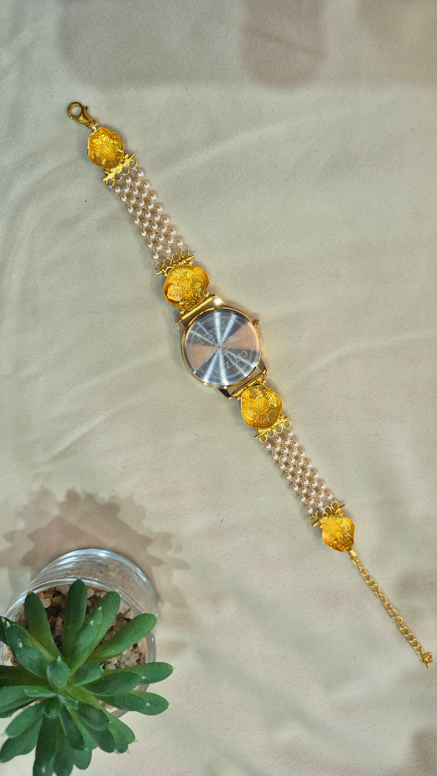 Gold Dial Gandaberunda pearl strap watch