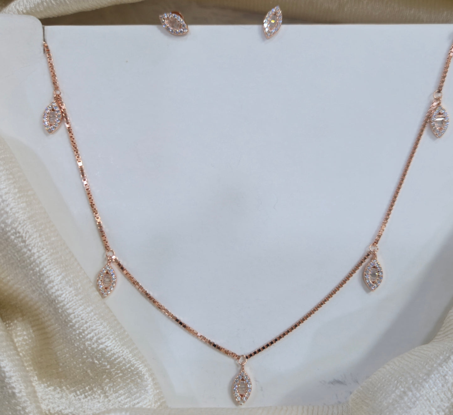 Leaf shaped white stone invisible chain