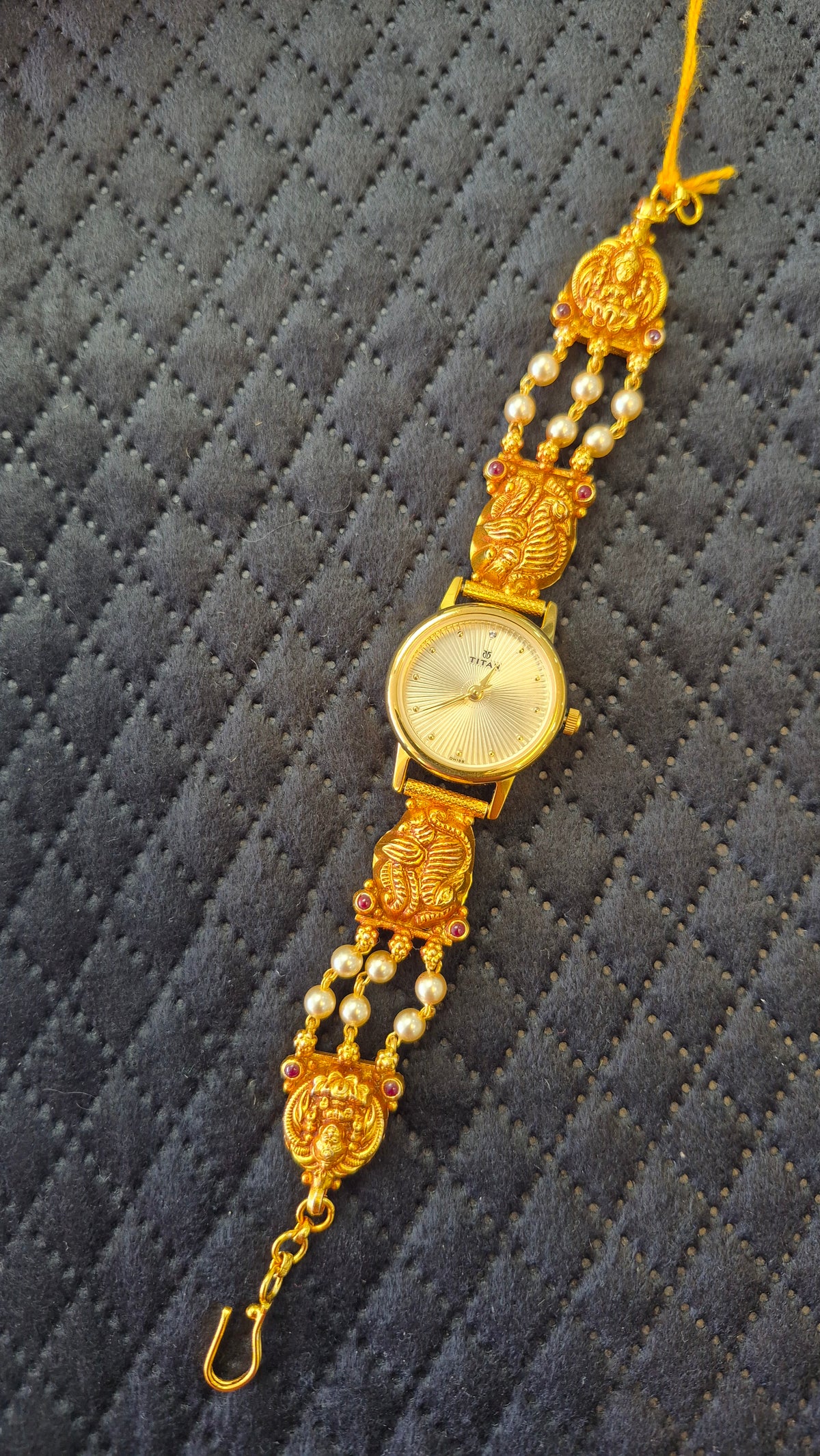 Original Titan watch with silver pearl nakshi strap