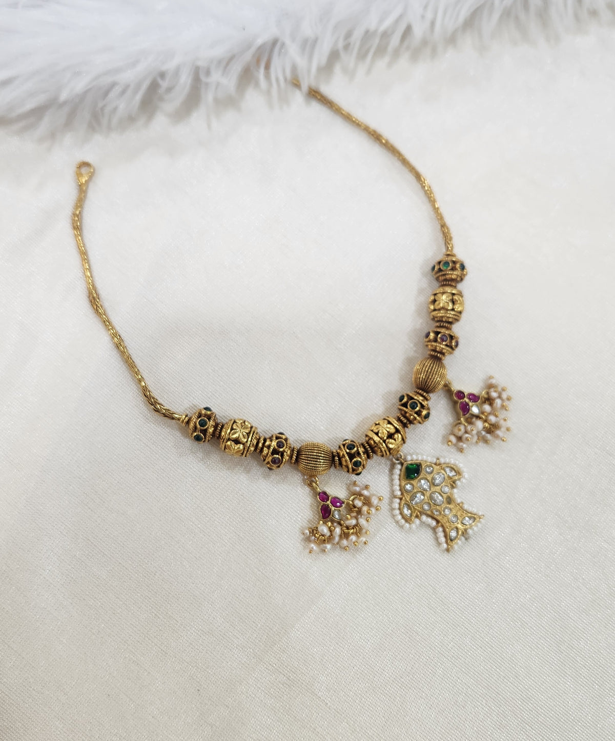 Nagas balls and kundan necklace