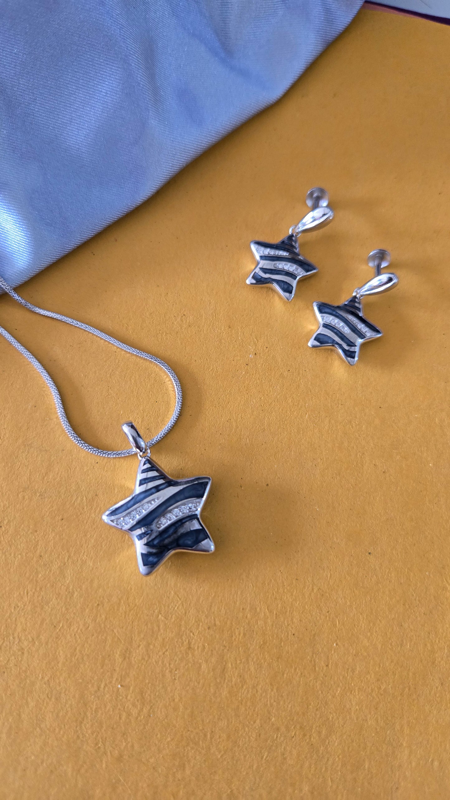 Black and white star pendant and stud sterling silver set