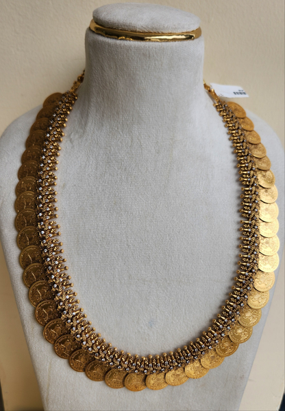 Kasu mala adorned with stones