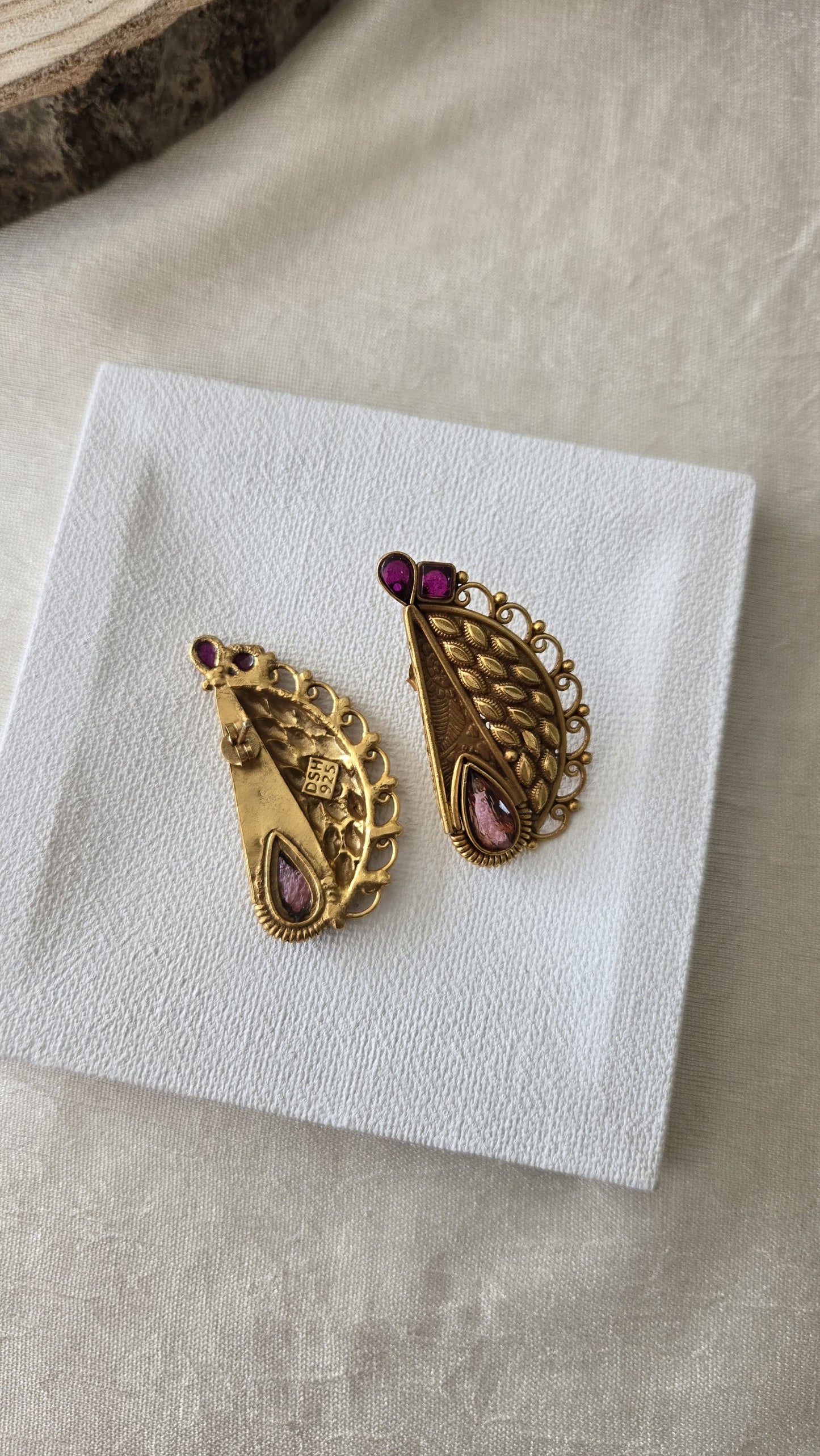Contemporary studs with purple semiprecious stones