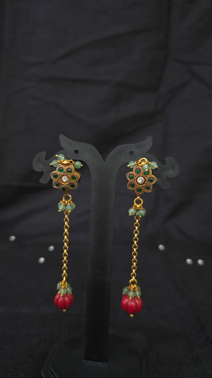 Green kundan with long coral drops