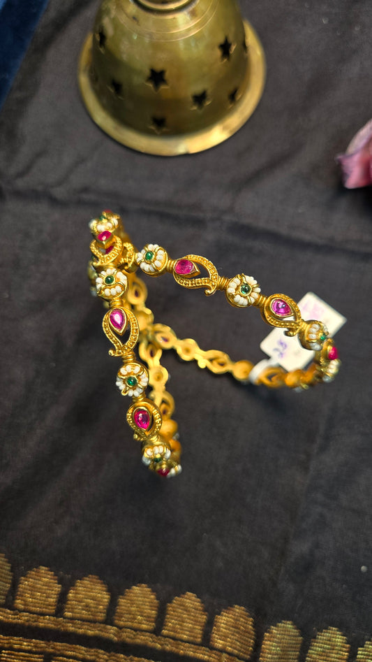 Pearls and ruby bangles
