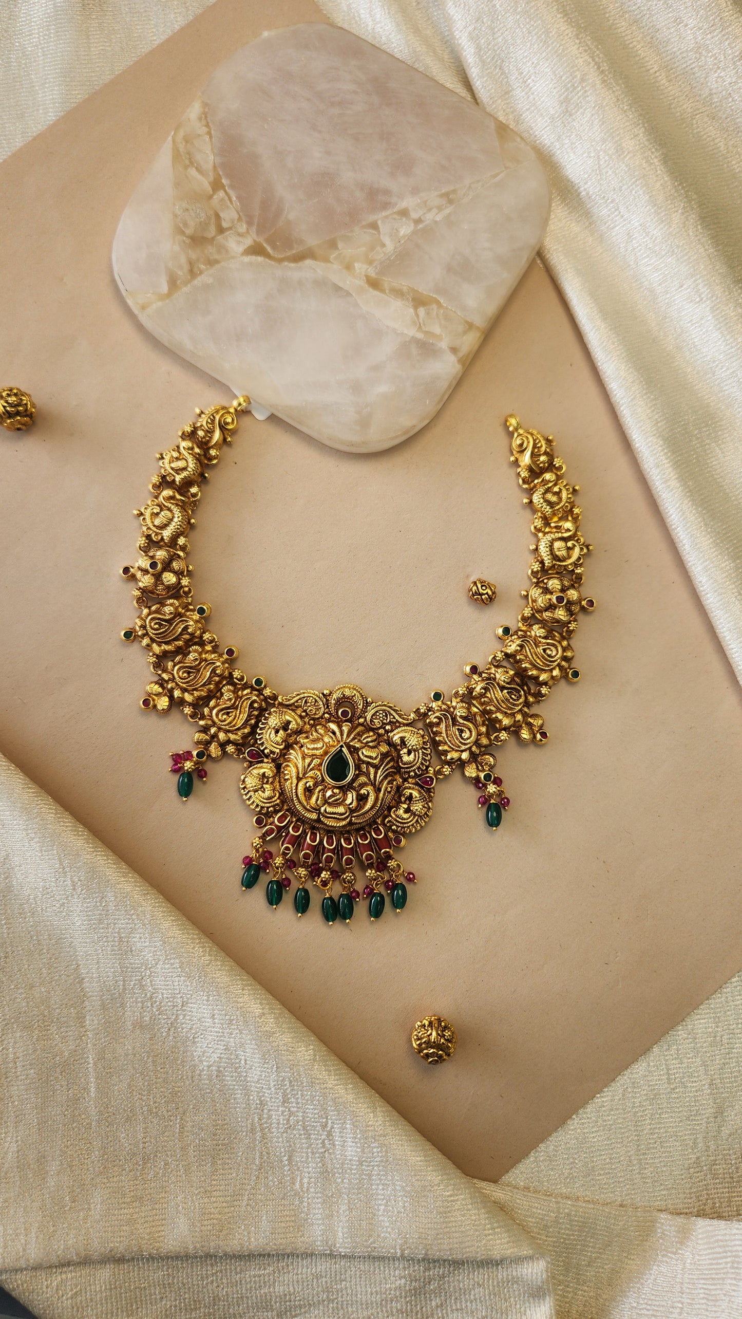 Nagas Necklace with coral and green beads details