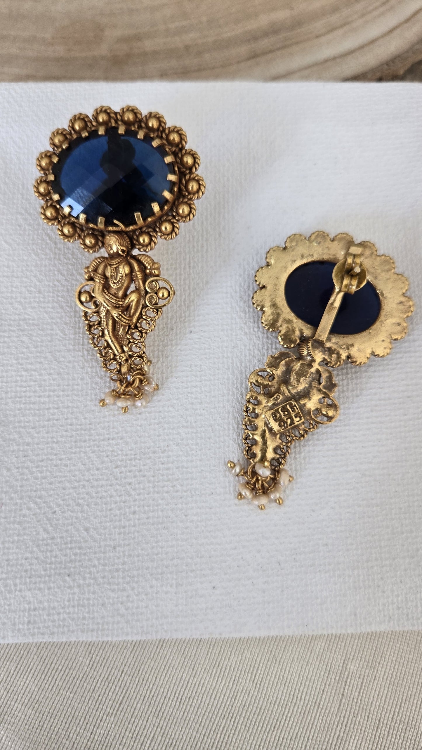 Blue contemporary studs with dancing girls motif