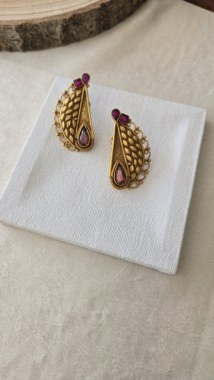 Contemporary studs with purple semiprecious stones