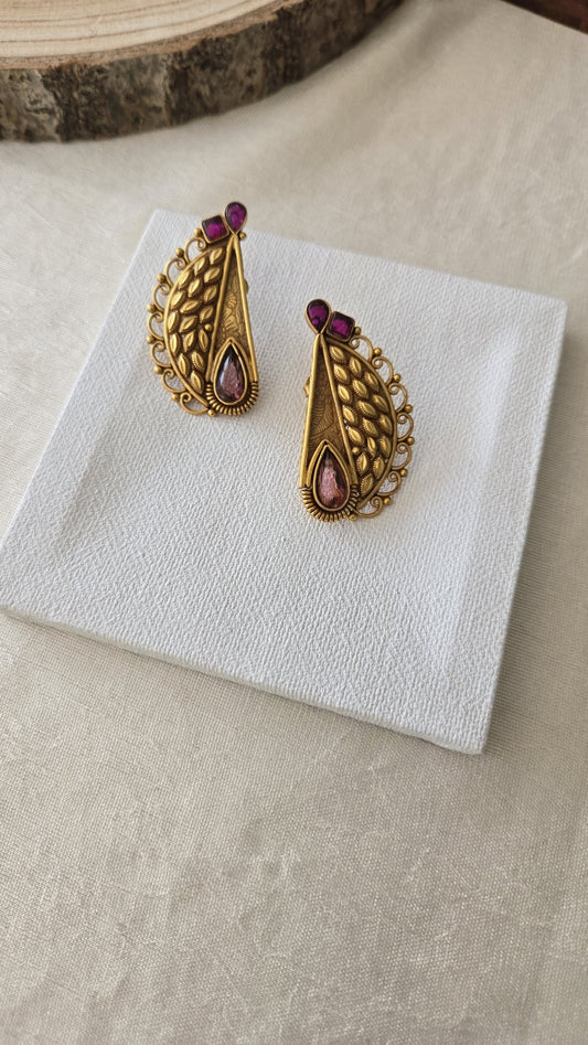 Contemporary studs with purple semiprecious stones
