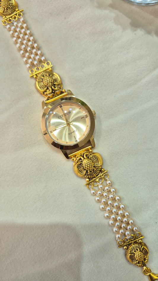 Gold Dial Gandaberunda pearl strap watch