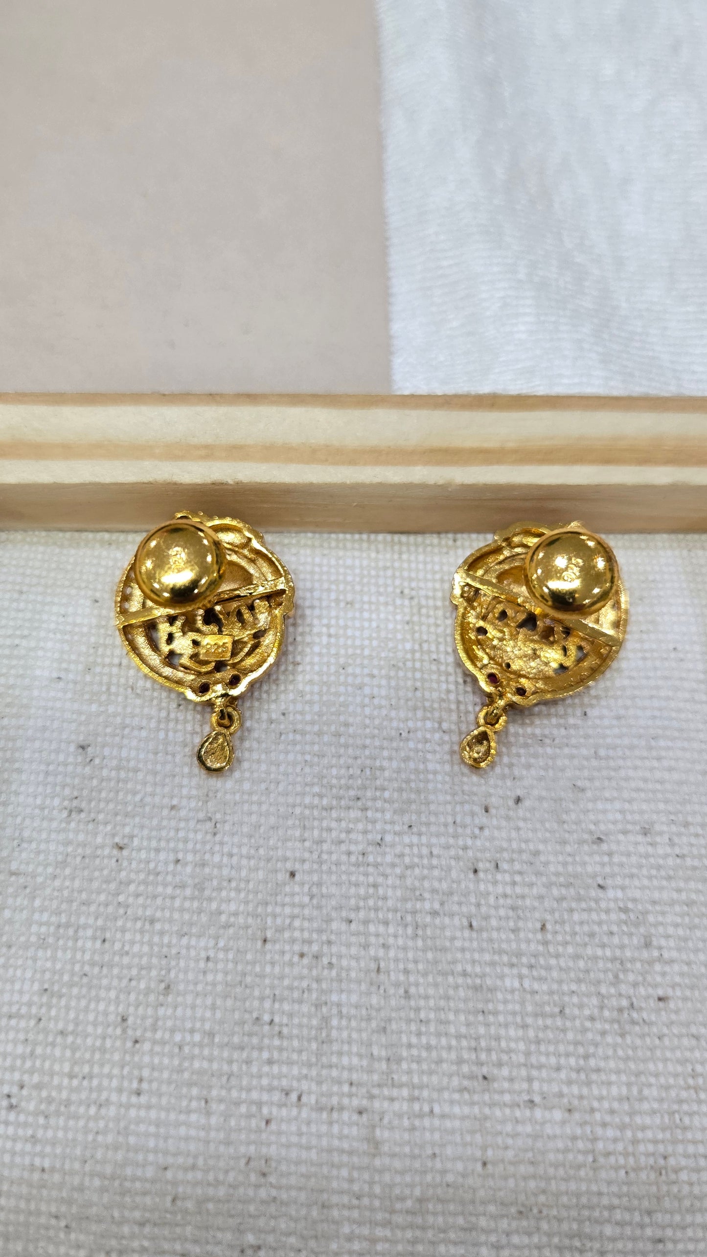 Elephant stud with gold drop