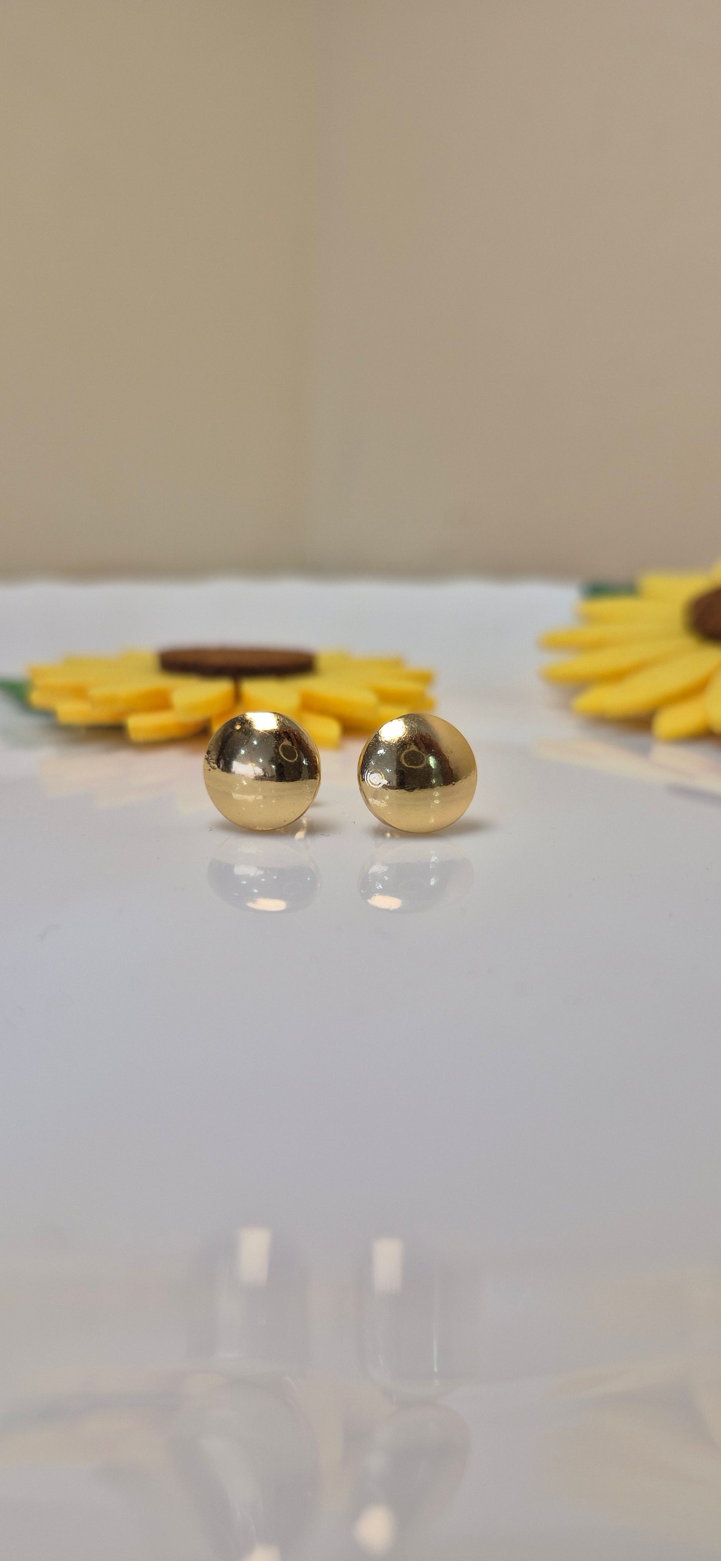 Embossed round solid stud