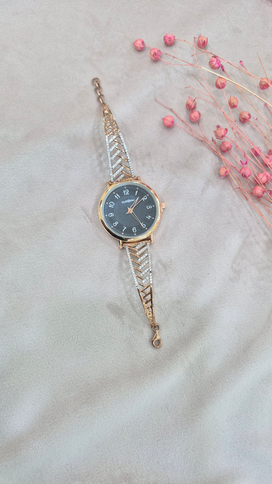 Rosegold watch with black dial