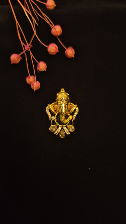 Ganesha pendant with leaf carved green stone