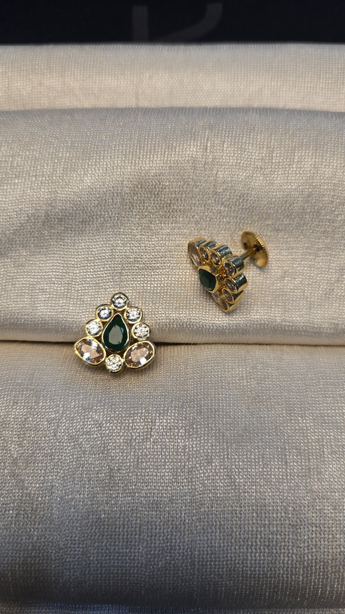 Polki with green semi precious stone studs