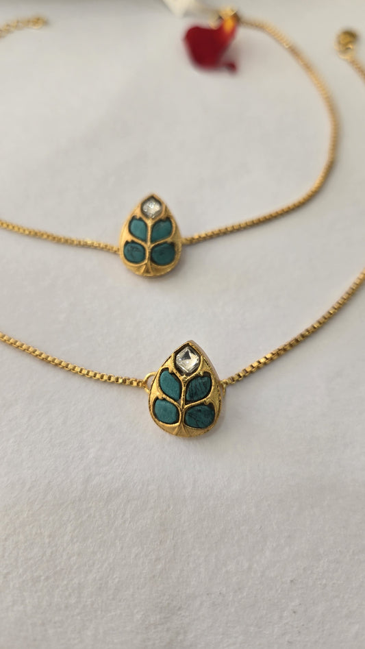 92.5 silver with 24k gold polish Kundan Anklets with turquoise leaf motifs