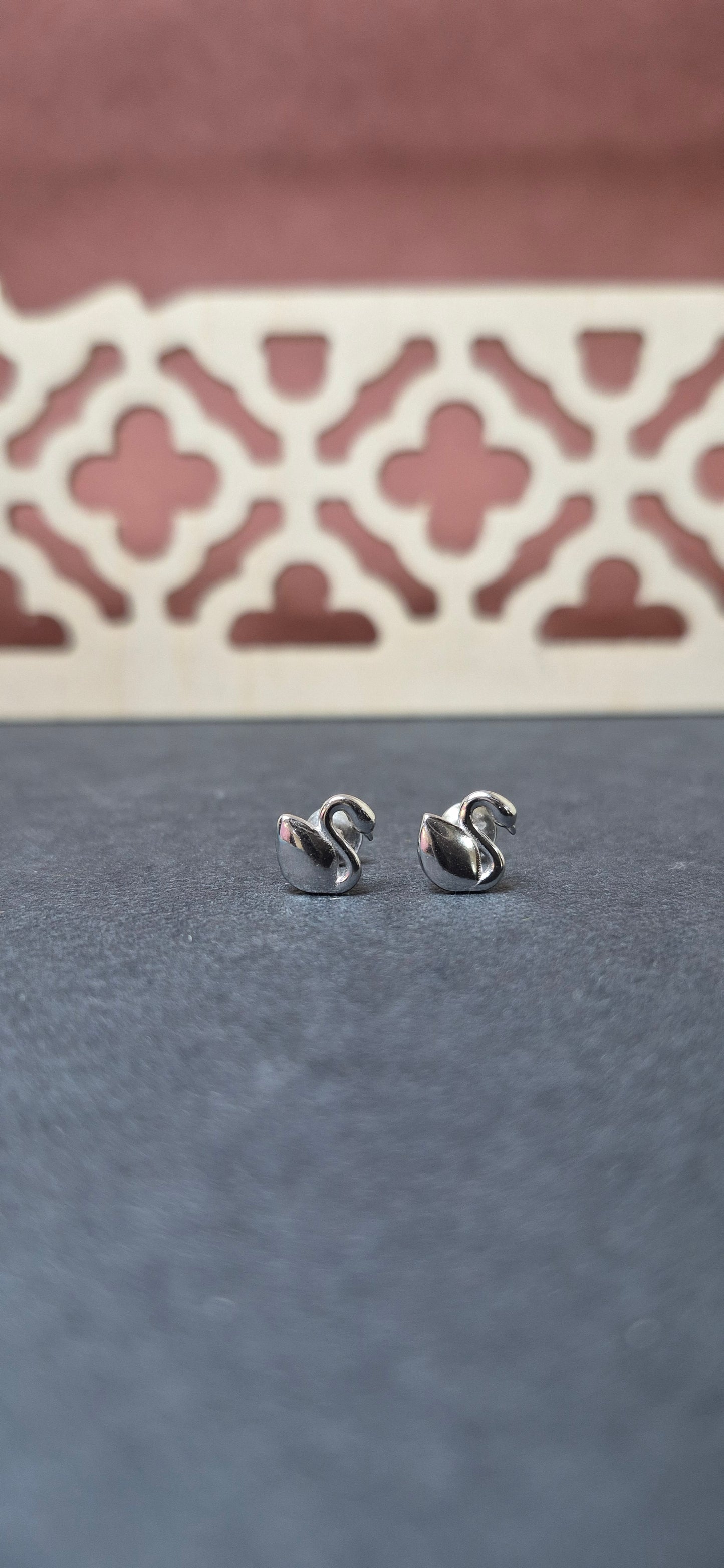 Swan studs