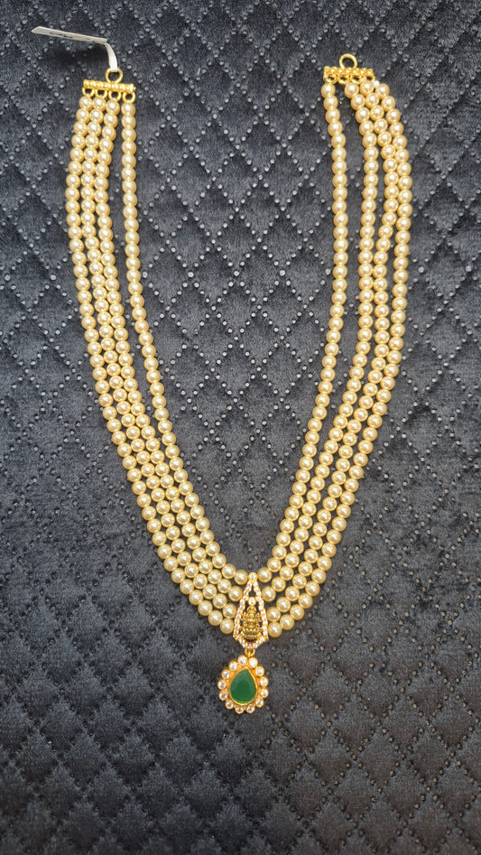 4 layer Short Necklace in pearls with Green stones and Lakshmi motiff
