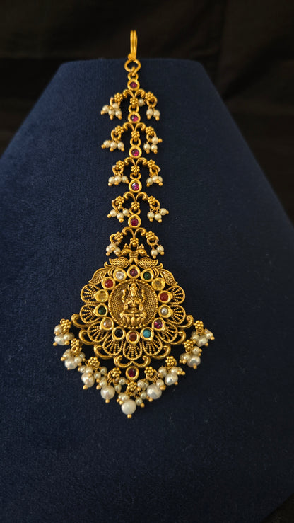 Antique navratna maang tikka with lakshmi