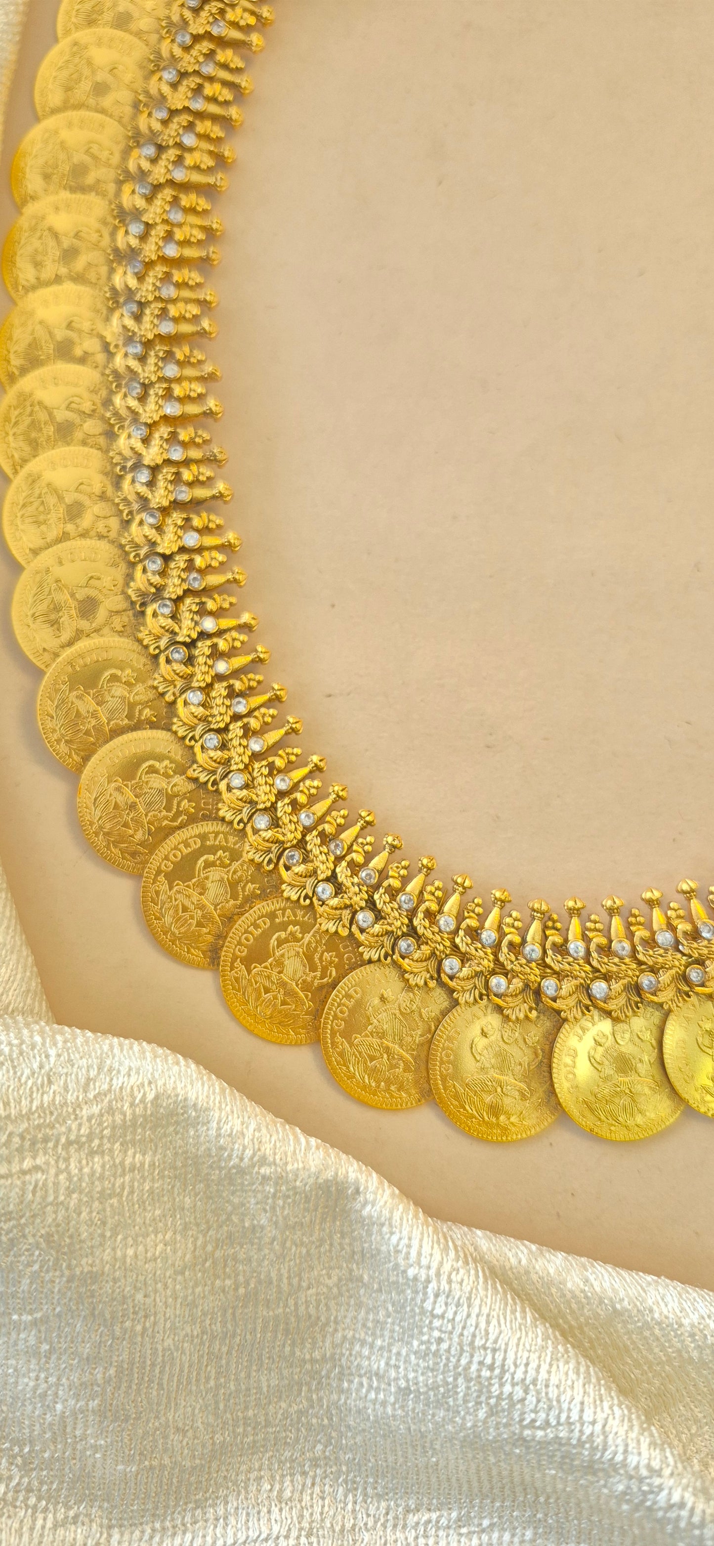 Kasu mala adorned with stones