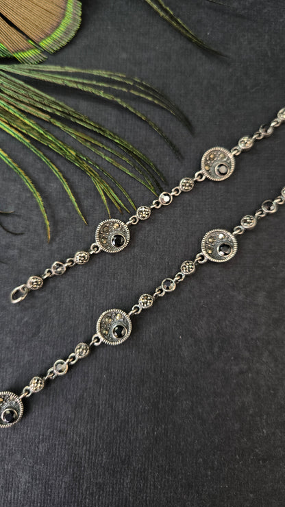 Black marka close setting anklets