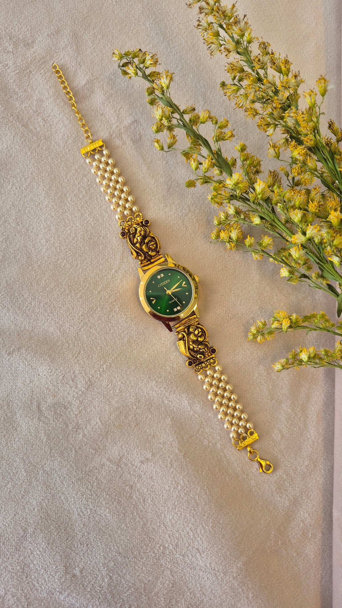 Green Dial pearl strap watch