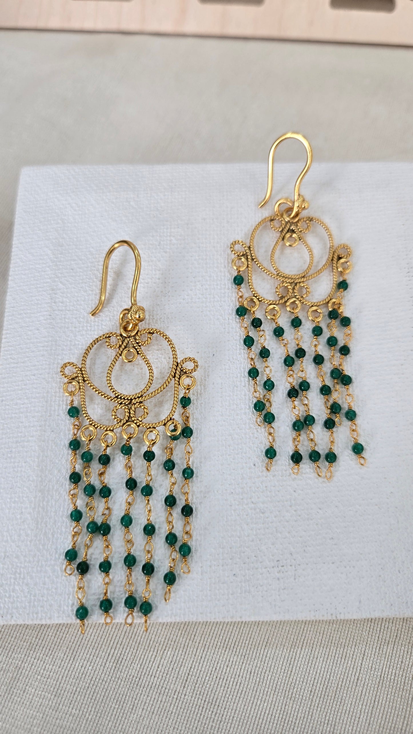 Green drop hook style earrings