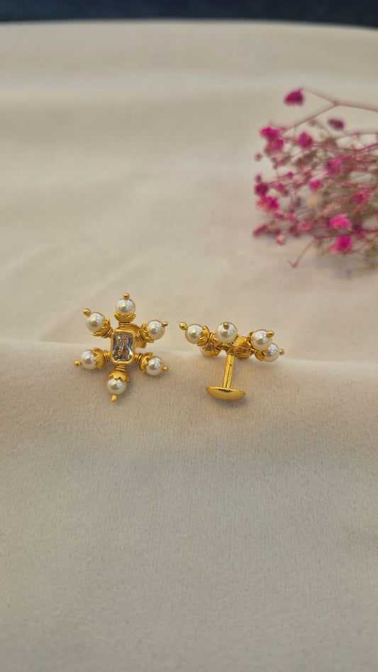 Pearl stud with center white rectangular stone