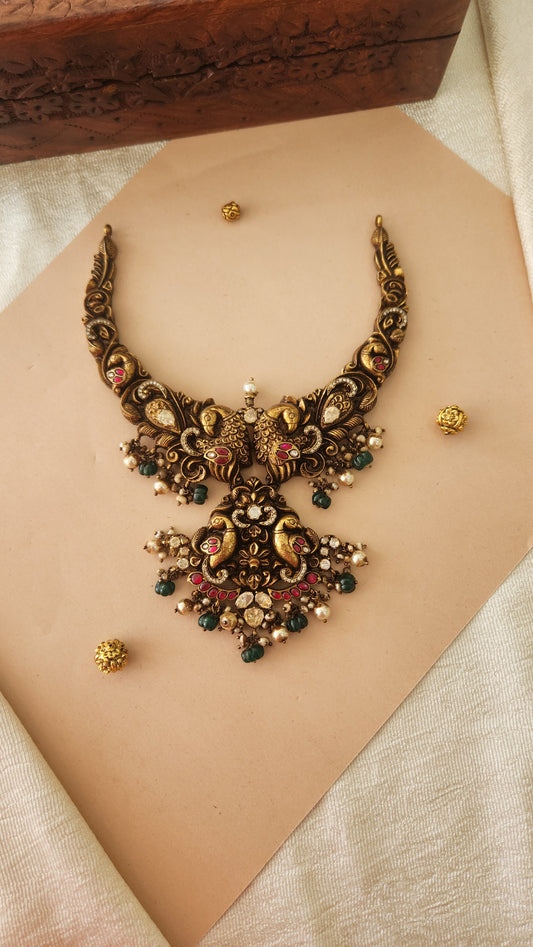 Deep Nakas Necklace with deep peacock motifs