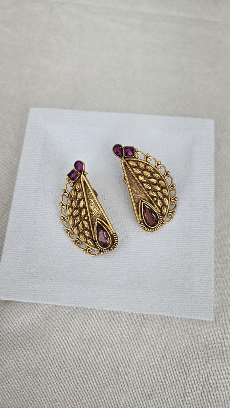 Contemporary studs with purple semiprecious stones