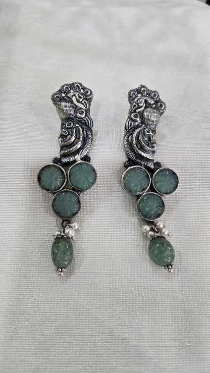 Peacock motifs silver studs