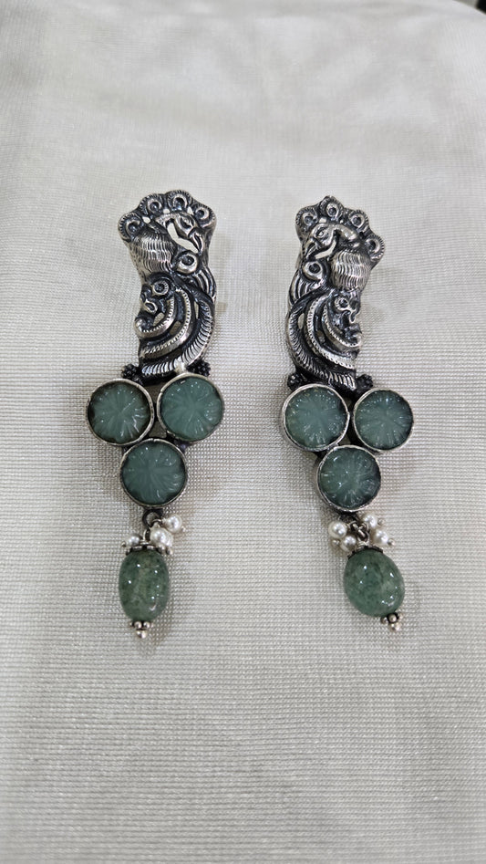 Peacock motifs silver studs