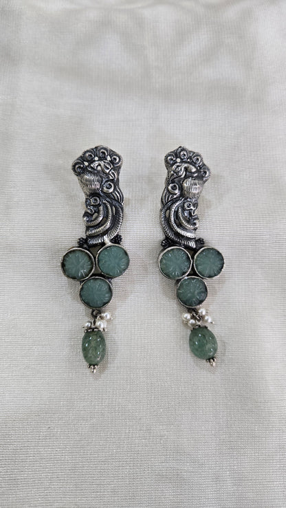 Peacock motifs silver studs