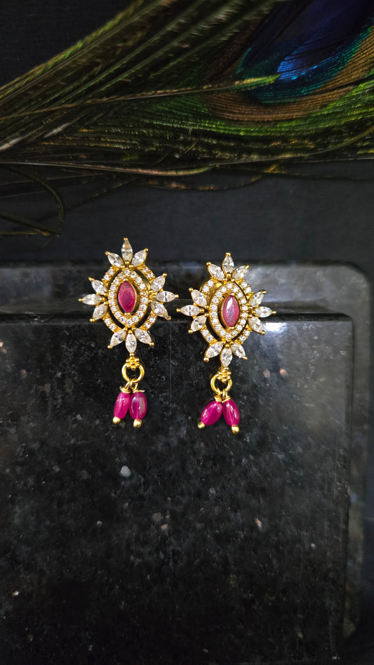 Zircon stone studs with red stone