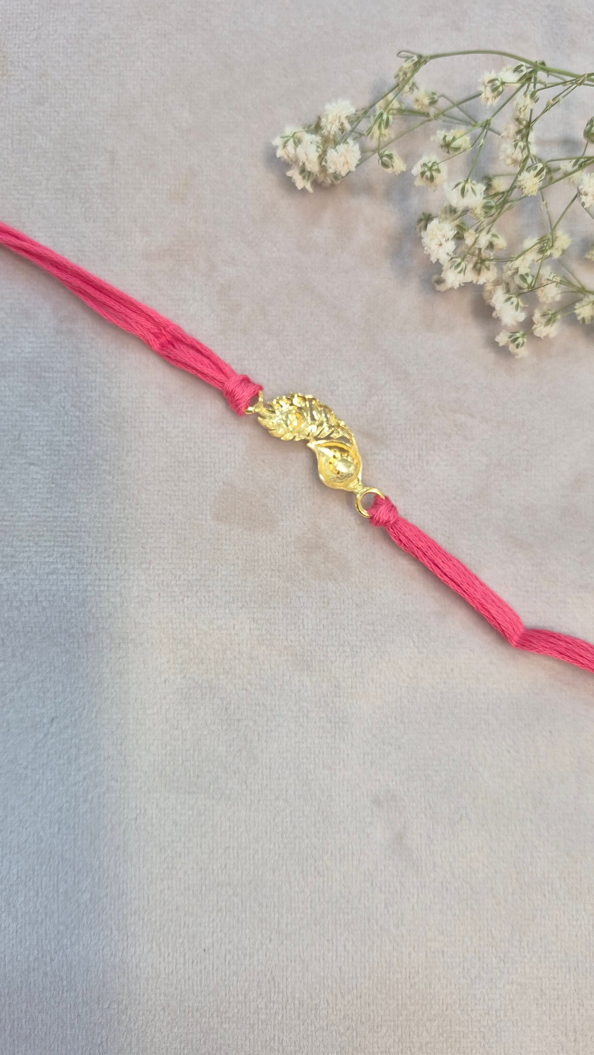 Peacock feather Rakhi