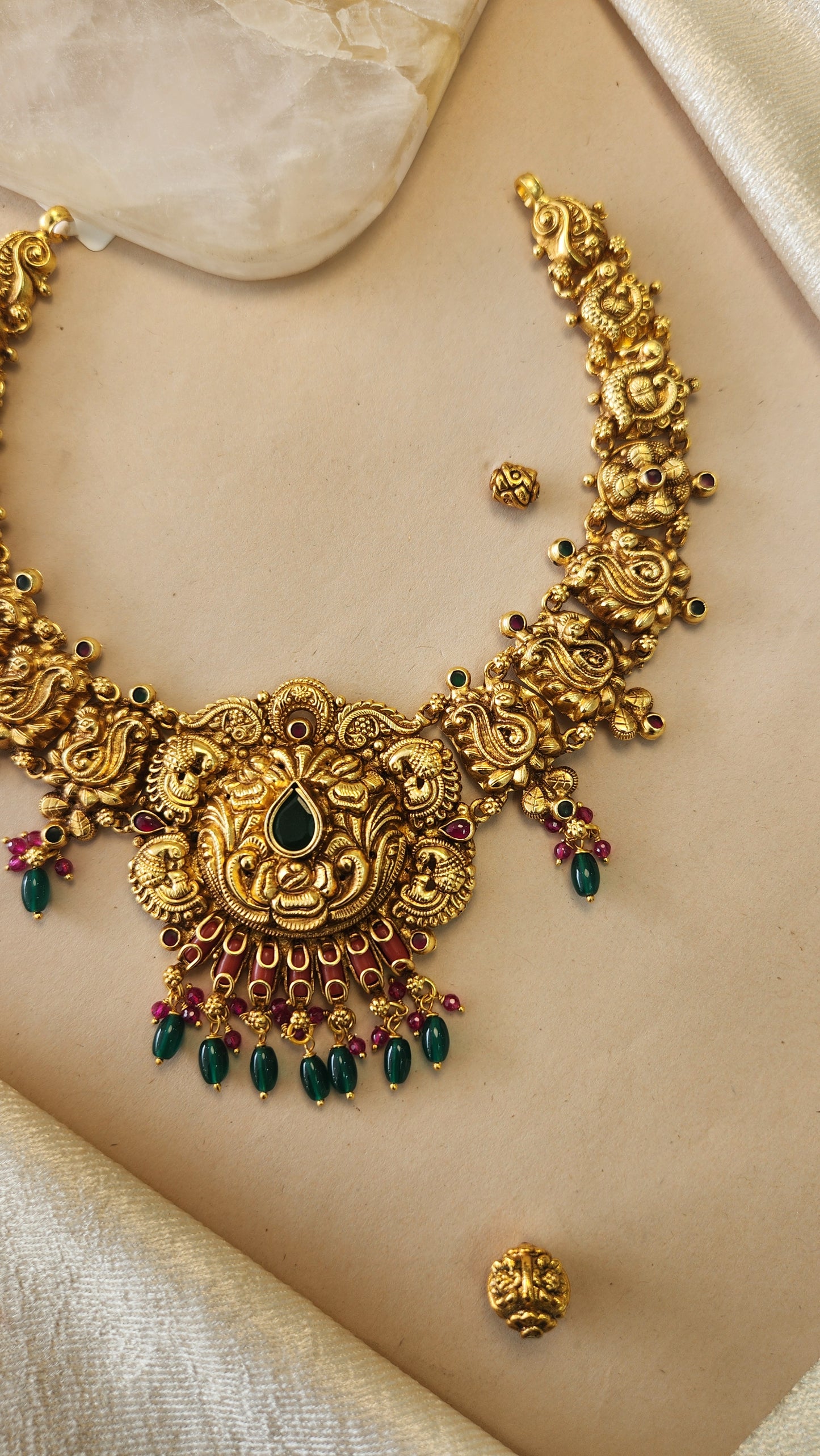 Nagas Necklace with coral and green beads details