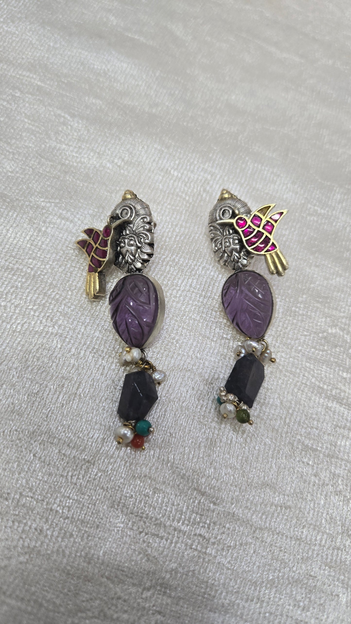 Dual tone oxidised earring with semiprecious stones and kundan bird motifs