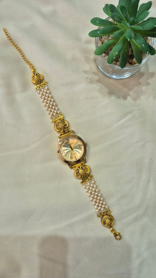 Gold Dial Gandaberunda pearl strap watch