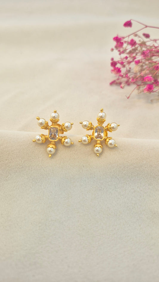 Pearl stud with center white rectangular stone
