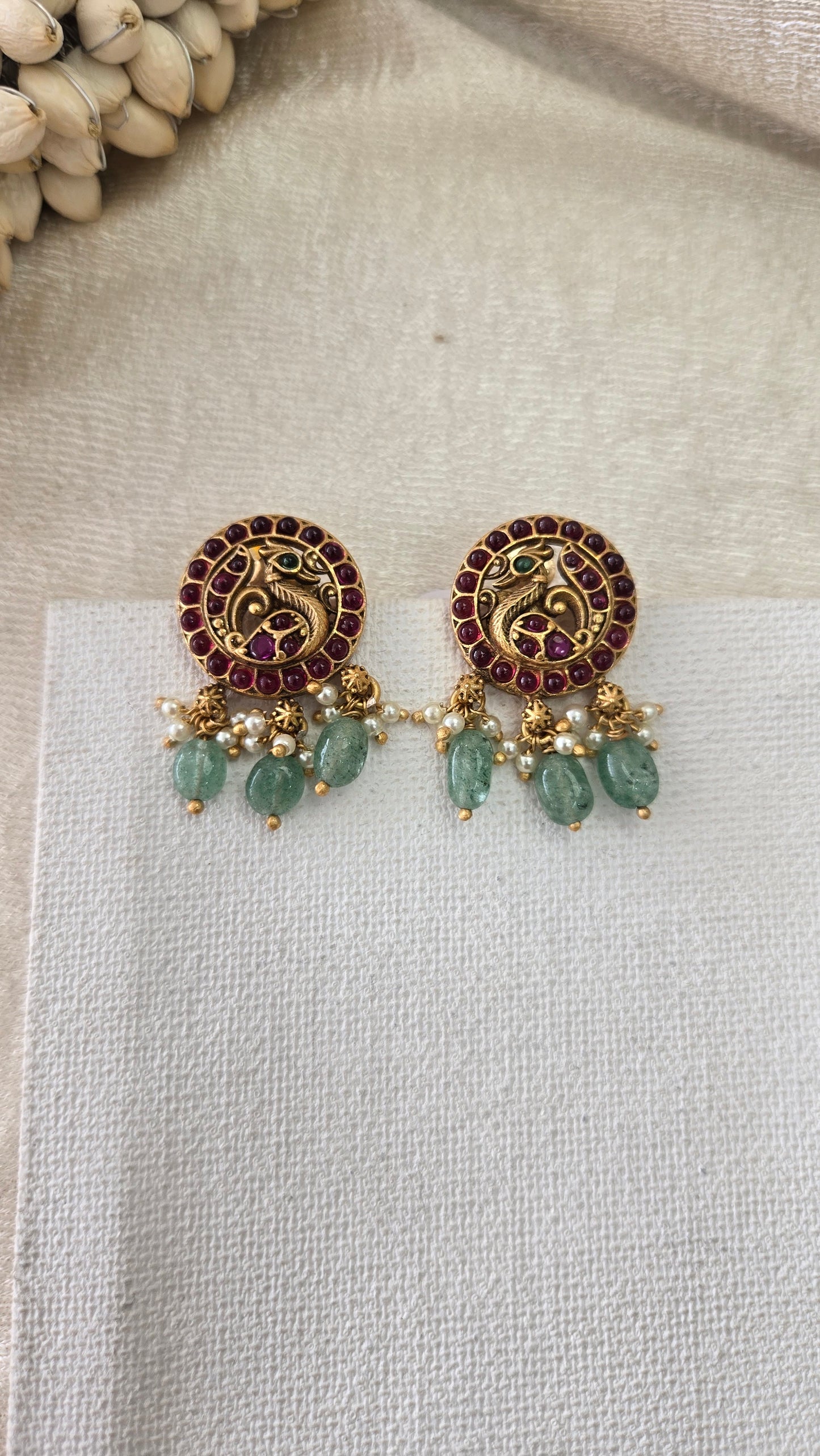 Peacock kundan earrings with green bead drops