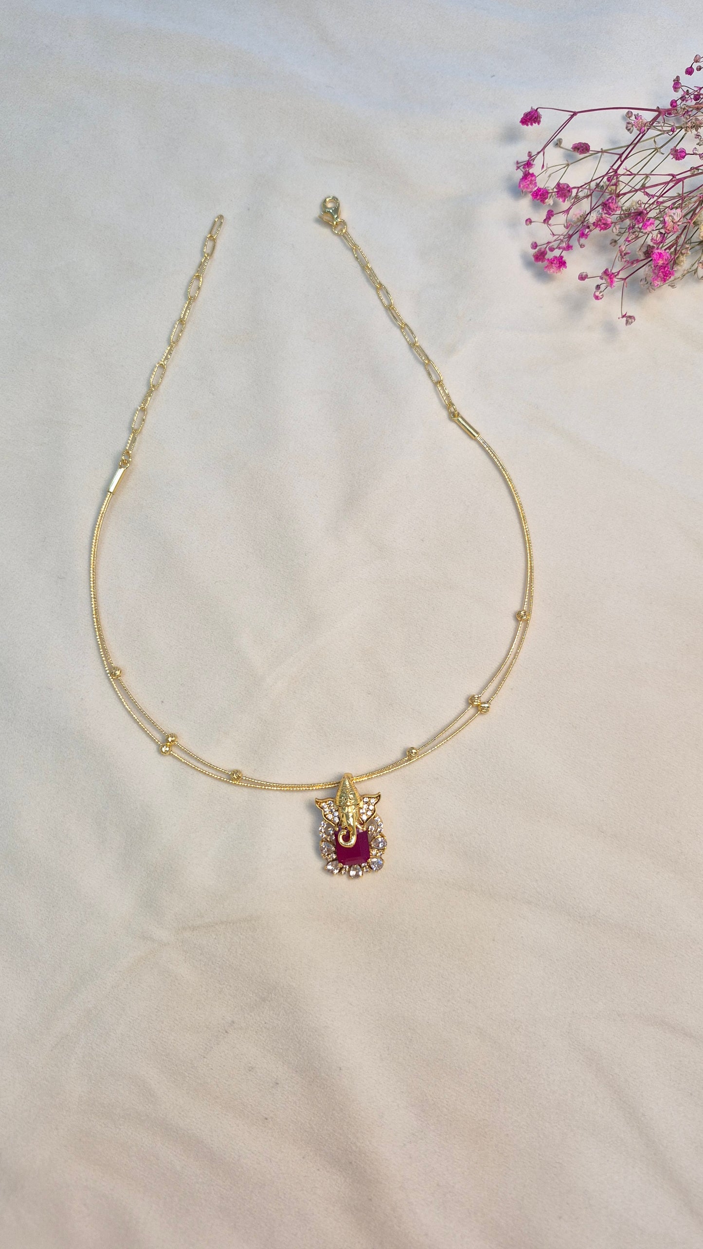 Ganesha red pendant with 2 line gold ball Hasli