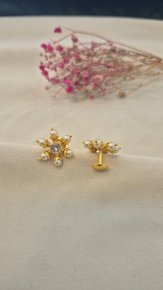 Pearl stud with center white round stone