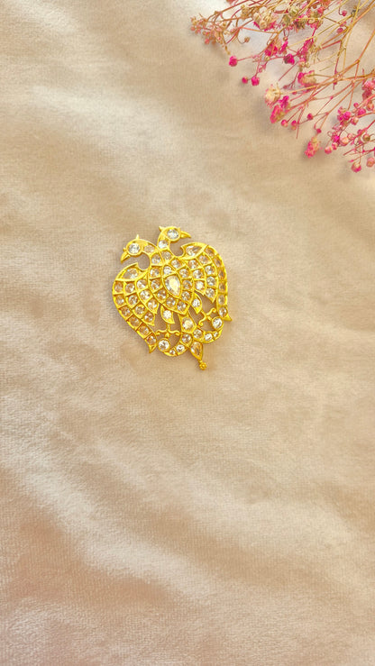 Ganda berunda pendant on white stones