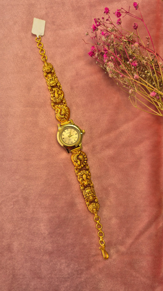 Peacock and lakshmi round gold dial